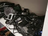 a lot of wires on a shelf in a closet