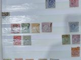 many different stamps on the wall in this room