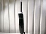 an image of a black and white vacuum cleaner