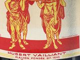 a bottle of wine with a picture of a man holding a flag