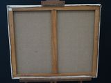 painting on a easel with a black background and a black background