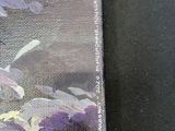 a painting of a purple and yellow flower on a black surface