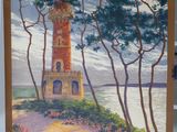 une peinture représentant un phare sur la façade d'un immeuble