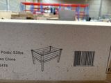 packaging for a wooden bench in a warehouse with a barcode on it