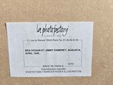 a label on the back of a box that says la phototory