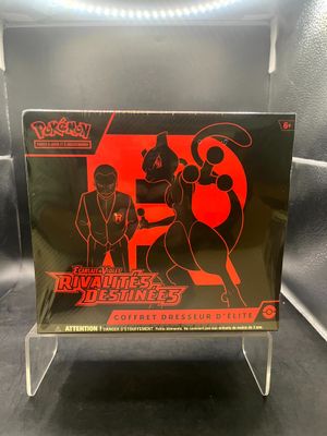 une boîte noire et rouge sur laquelle figure l'image de deux personnes