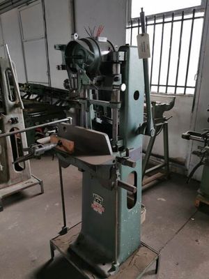 a machine that is sitting in a room with a lot of machines