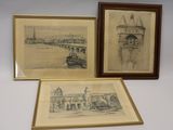three framed drawings of a castle and a bridge in a wooden frame