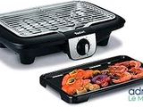 an image of a grill and a tray of food on a white background