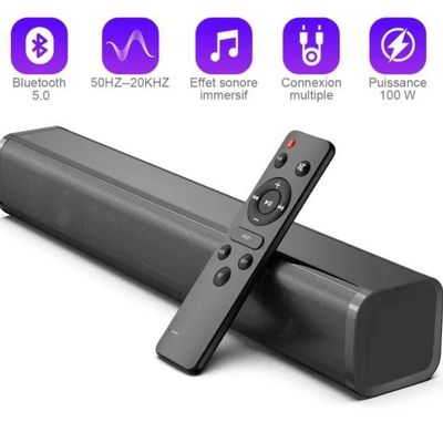 a close up of a remote control sitting on top of a speaker