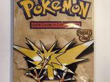 a close up of a bag of pokemon trading cards on a table
