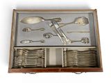 a tray with silverware and spoons in it