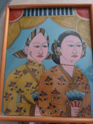 un tableau représentant deux femmes tenant un éventail à la main