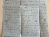 a close up of a piece of paper with writing on it