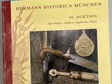 un livre sur lequel figure l'image d'un couteau et d'autres objets