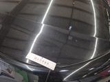 an image of a car with a sticker on the hood