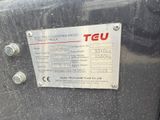 a sign on the back of a truck that says teu