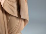 an image of a statue of a woman holding a baby