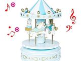 a blue and white carousel with musical notes around it