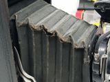 a close up of an old camera with a broken lens