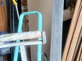 a man that is working on a piece of wood
