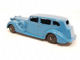 a blue toy car that is sitting on a white surface