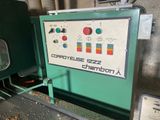 a picture of a machine that is working on a piece of wood