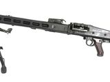 a close up of a machine gun on a white background