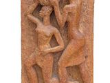 an image of a sculpture of two women and a man on a rock