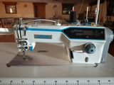 an image of a sewing machine on a table