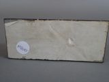 a small box with a sticker on it sitting on a table