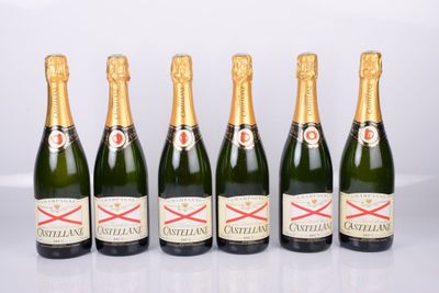 six bottles of champagne are lined up in a row