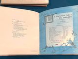 an open book with a picture of a castle on it