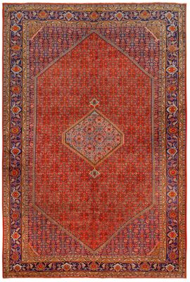 un tapis rouge et bleu à motifs en losanges