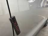 a remote control attached to the side of a car