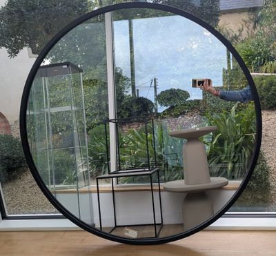 a man taking a picture of himself in a mirror