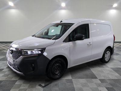 the white van is parked on a checkered tile floor