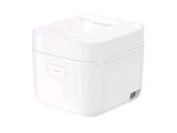 a white rice cooker sitting on top of a white table