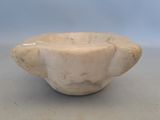 an image of a white bowl sitting on top of a table