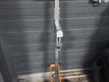 an image of a small hand truck that is parked in a garage