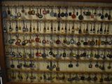 a picture of a display case filled with lots of keychains