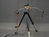a tripod with a camera on it on a tripod