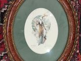 an old picture of a woman holding a parasol in a wooden frame