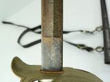 a person holding a sword in their hand