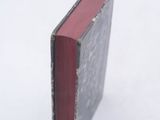 a book that is sitting in the snow on the ground