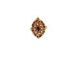 a close up of a gold ring with red and white stones