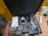a black case with tools in it sitting on a table