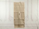 a towel hanging on a clothes line in a room