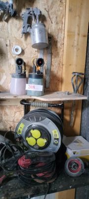 a shelf with various tools on it in a room