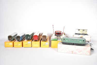 a lot of toy trains that are sitting on a table